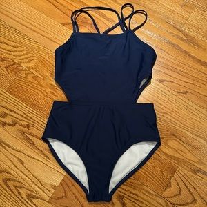 Kanu kids one piece with cut outs excellent bathing suit size 10